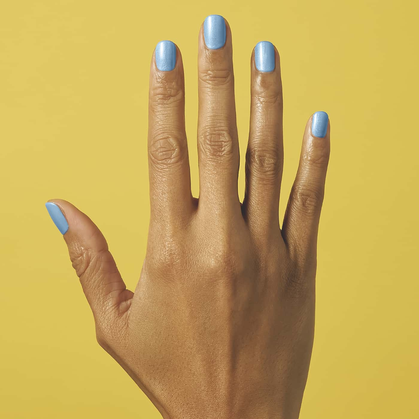 Ljus himmelsblå-grått nagellack med aquagrönt skimmer | CND Vinylux