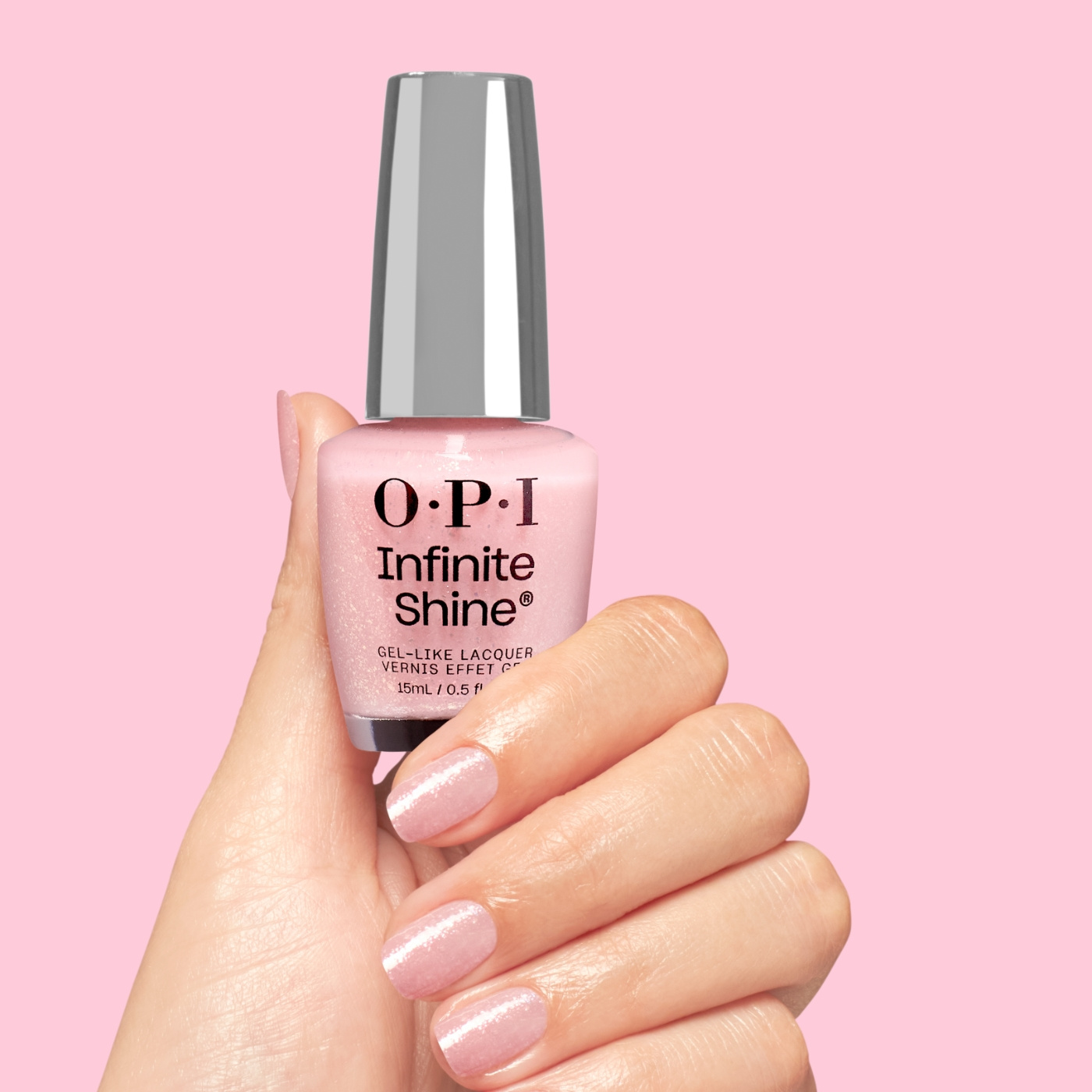 OPI IS Sneak a Pink - Ljusrosa nagellack med subtilt glitter för en mjuk och romantisk manikyr