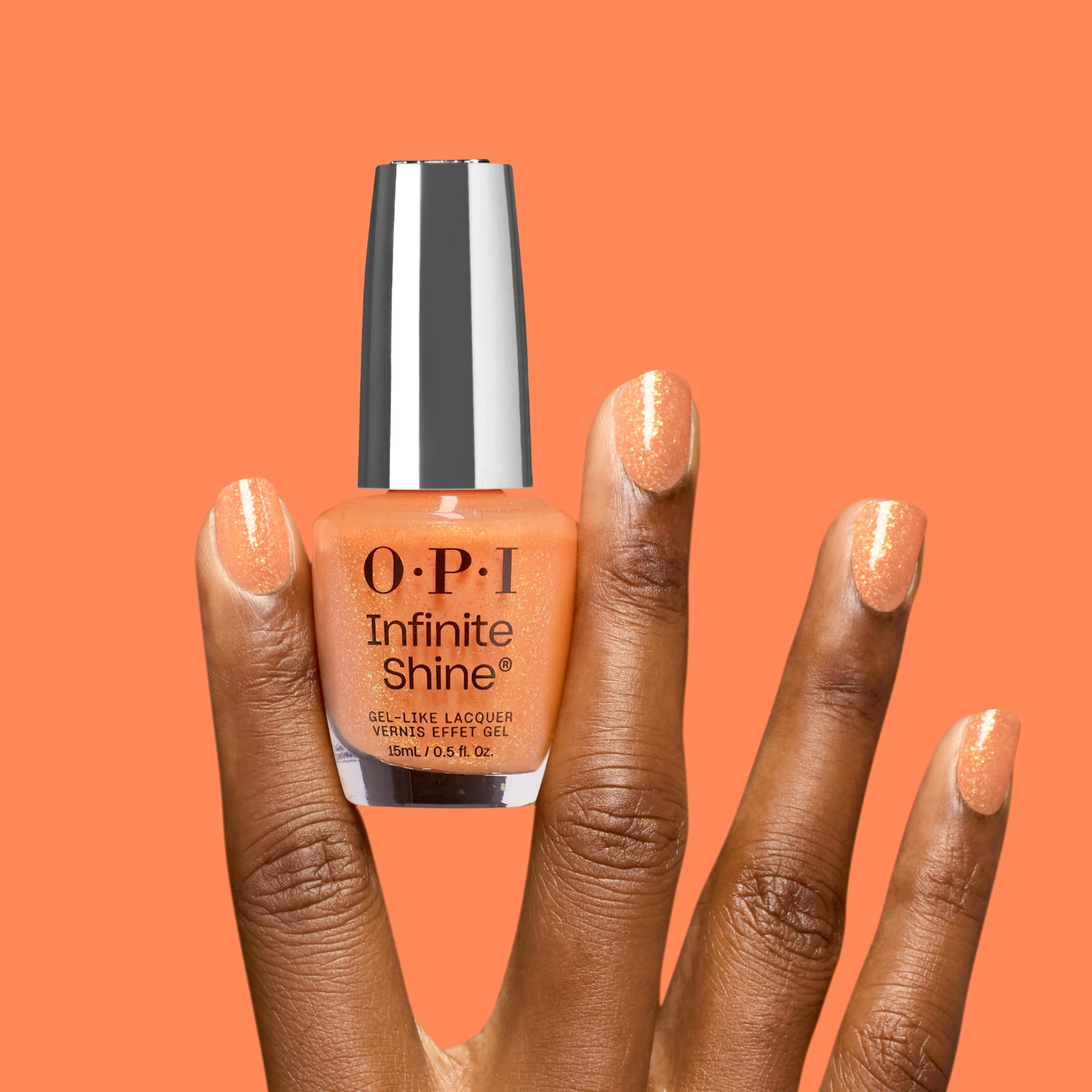 OPI IS Dreamsicle - Apelsinfärgat nagellack med gyllene glitter för en färgstark och energifylld manikyr