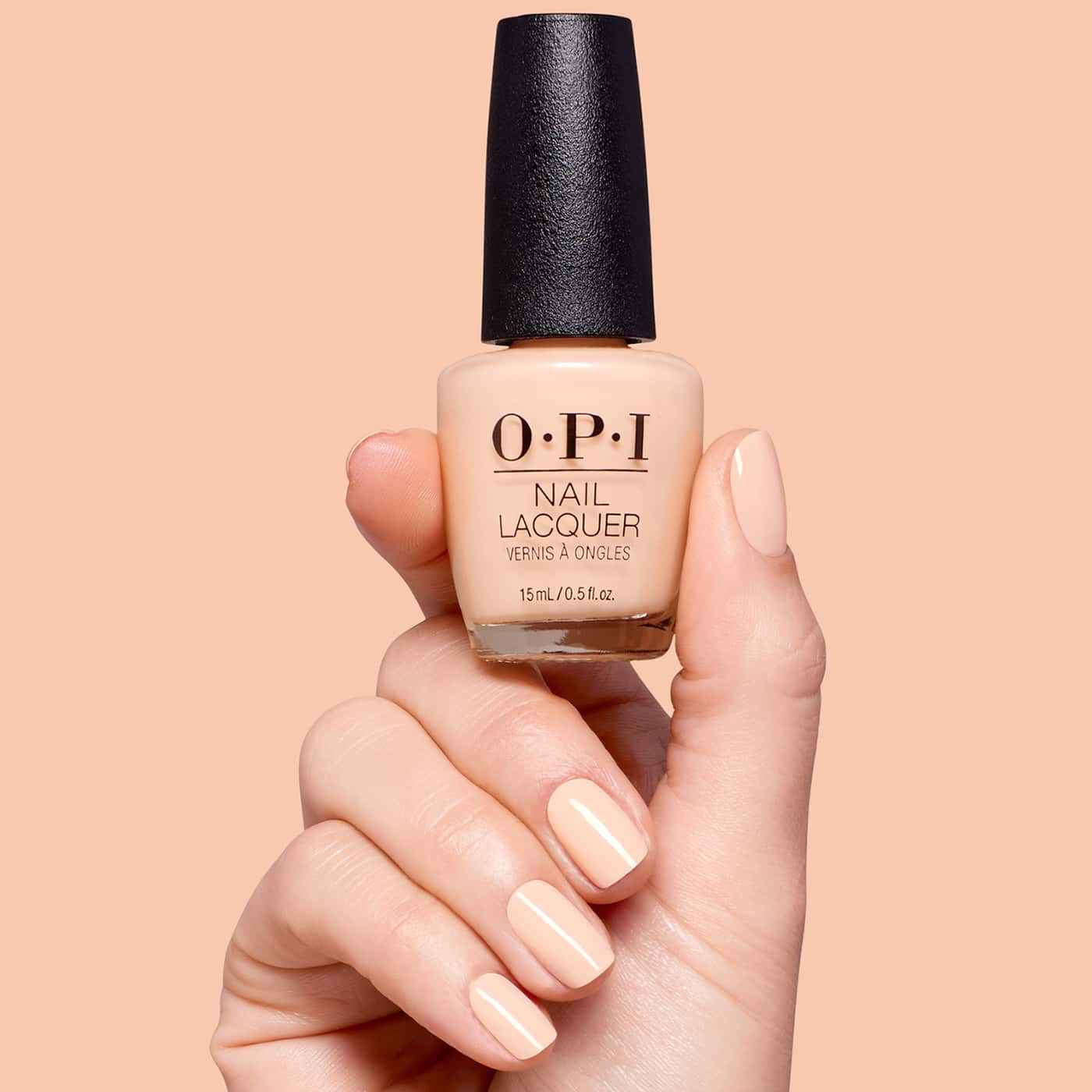 opi most requested suzi take a vow nagellack i ljus rosa persikoton med krämig färg, mjuk glans och jämn finish på nageln