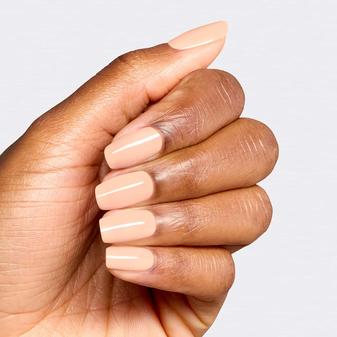 opi most requested suzi take a vow nagellack i ljus rosa persikoton med krämig färg, mjuk glans och jämn finish på nageln