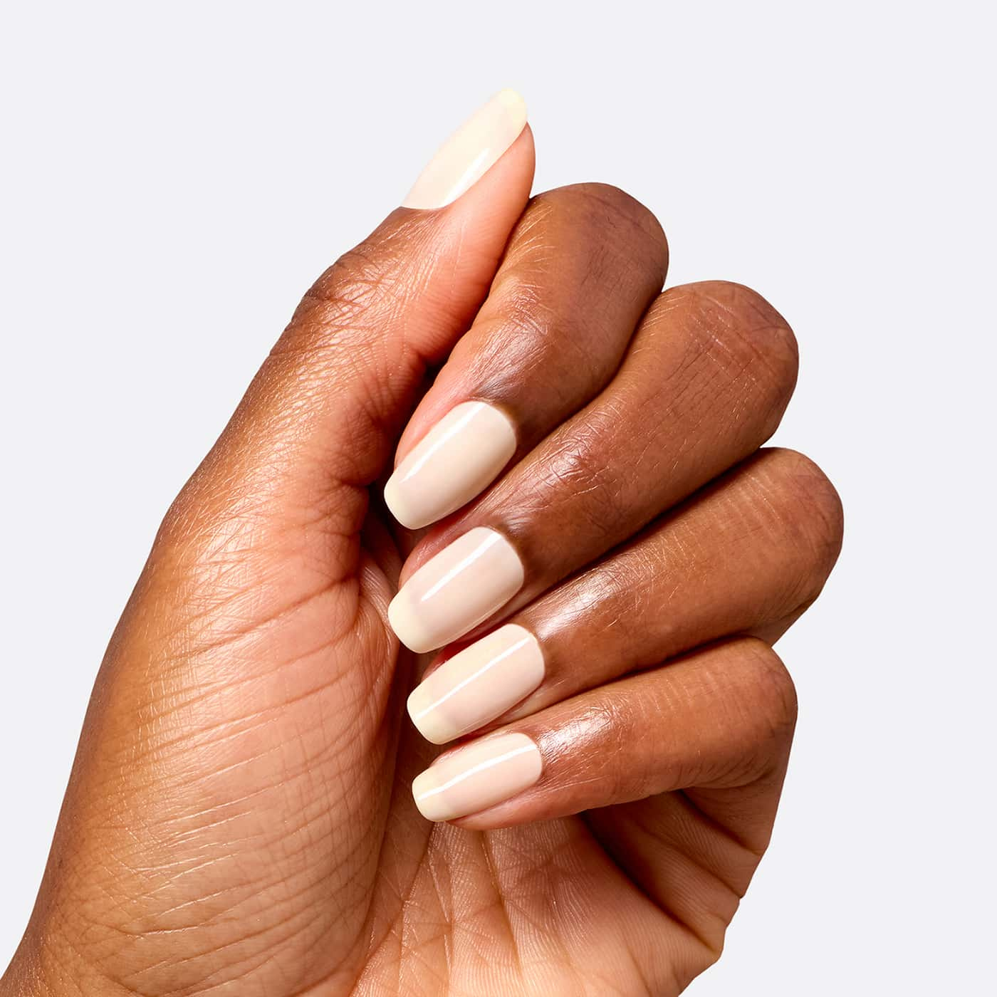 opi most requested throw me a wink nagellack i ljus beige nude med varm underton och skir, mjukt glansig finish på nageln