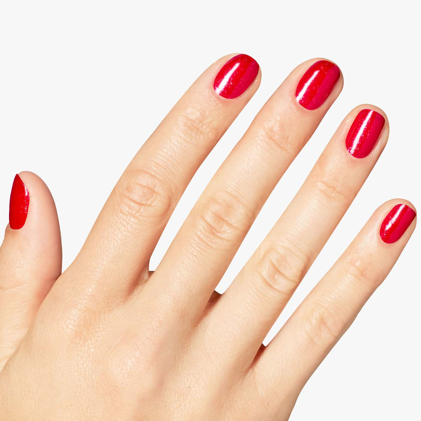 opi opicons big apple energy nagellack i klar körsbärsröd nyans med rosa skimmer